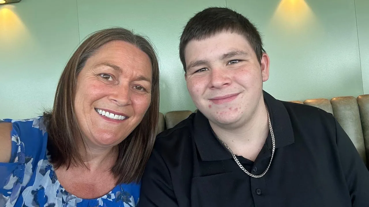 mother and son smiling