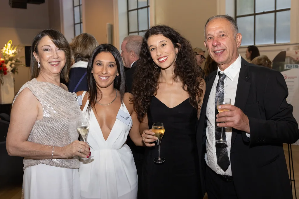 Image of mum, dad and two daughters at an event