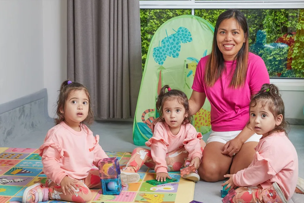 Image of mum with triplet girls