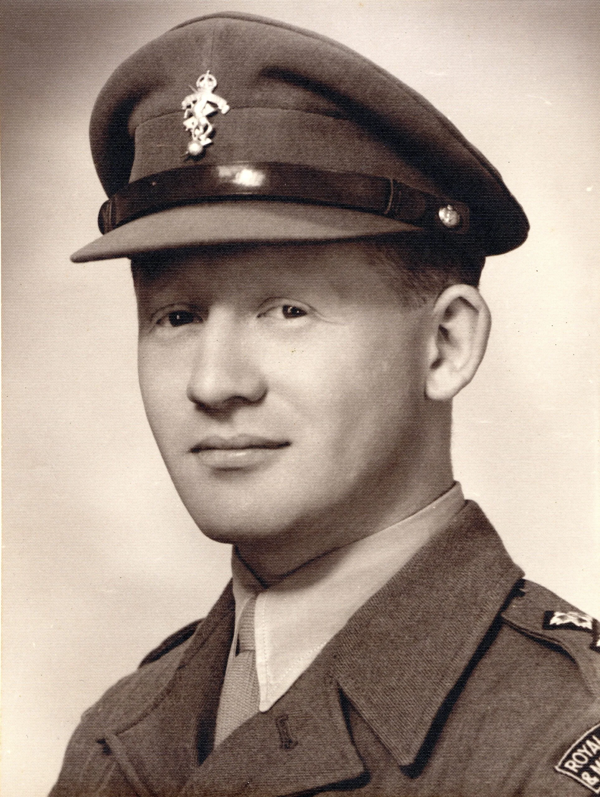 A man in military dress, photos is in black and white