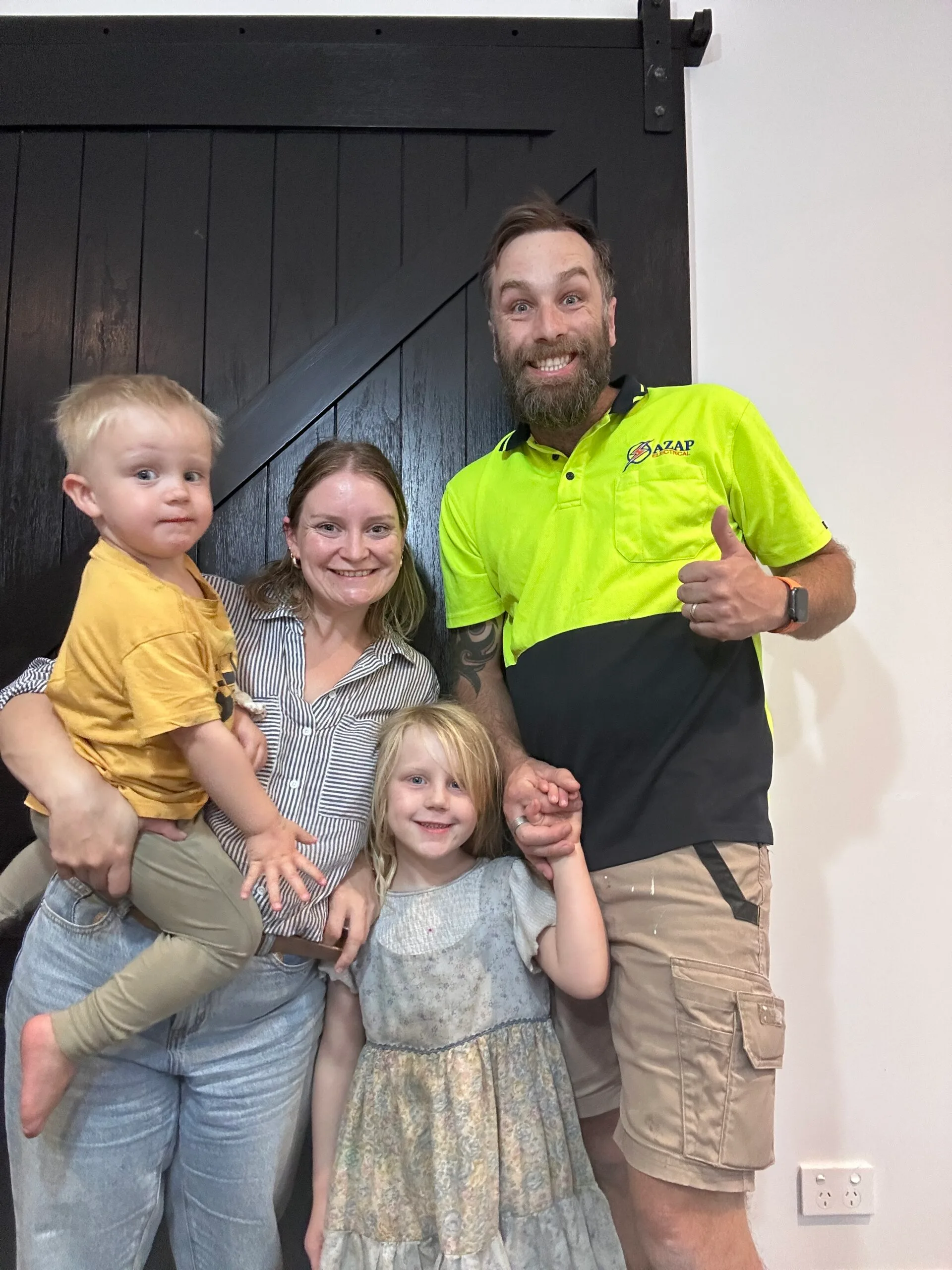 family photo of mum, dad, daughter and son