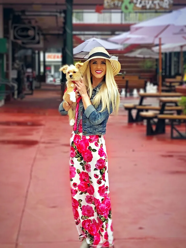 Image of woman holding her puppy