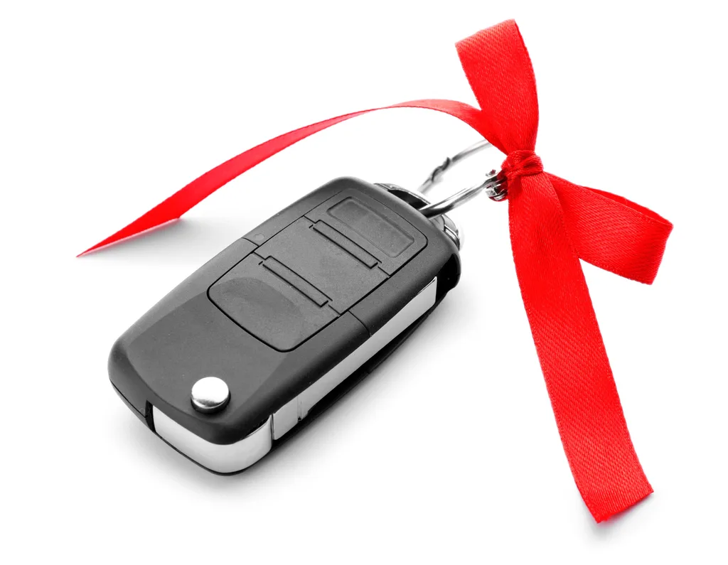 Electronic car key with red ribbon attached