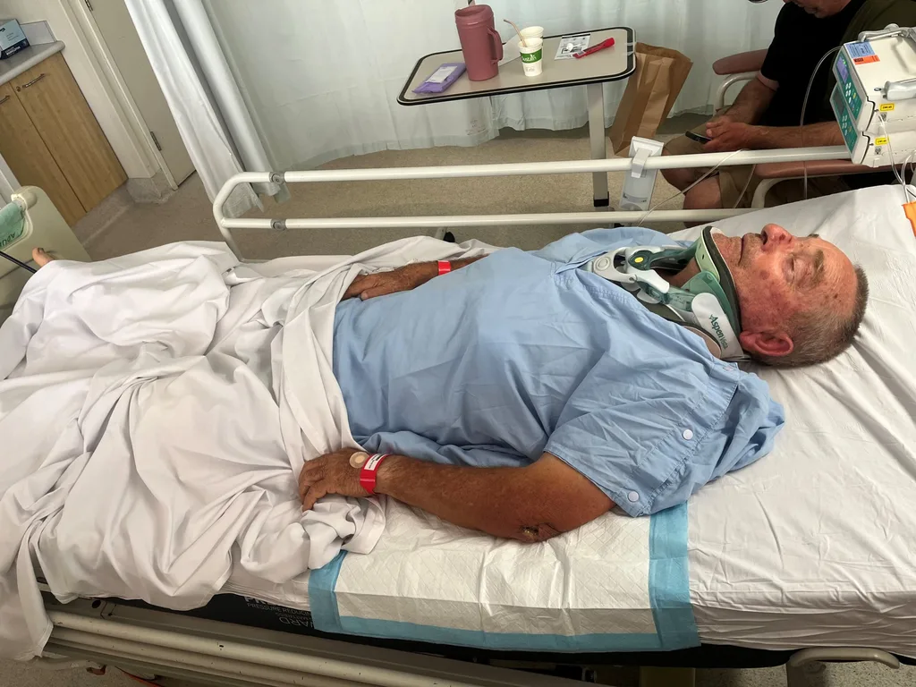 A man in a hospital bed