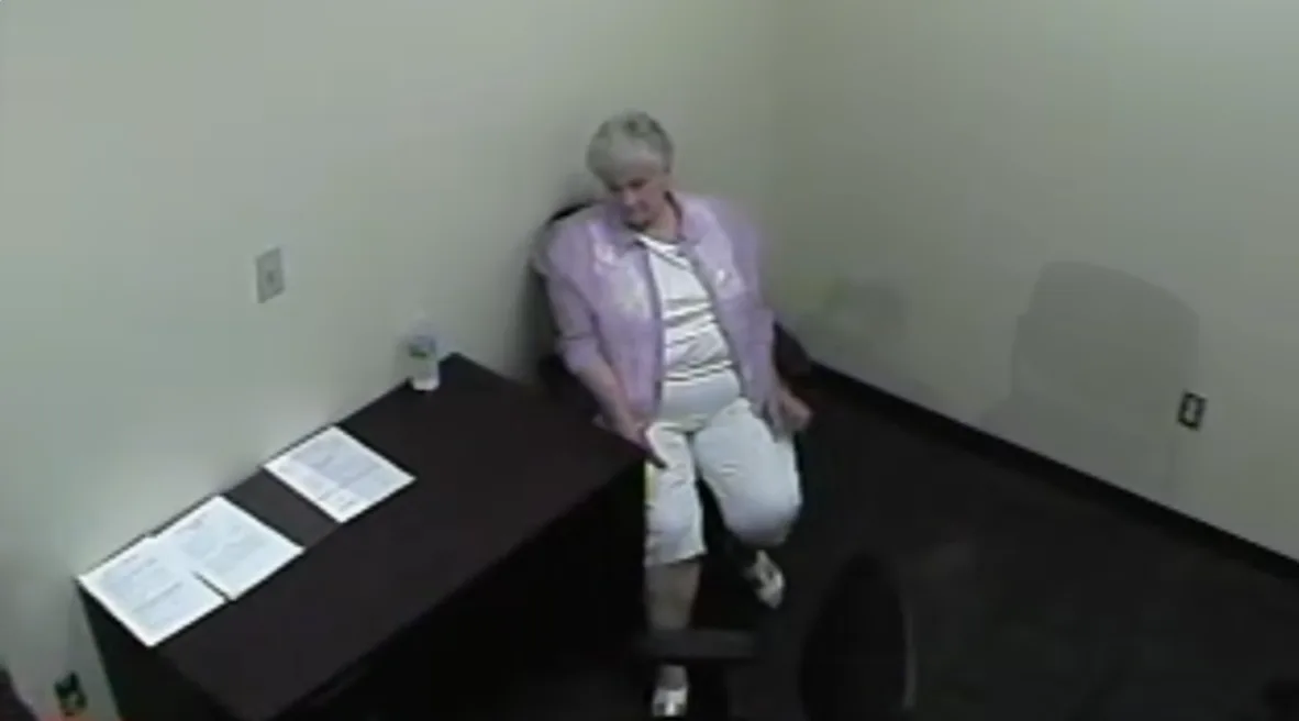 CCTV of Margaret Kellis being questioned about the murder crime of her husband Dallas