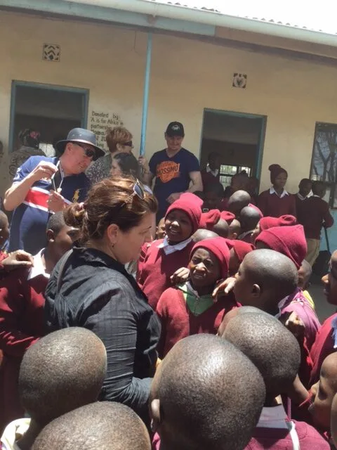 Donna with children at one of her schools in Africa