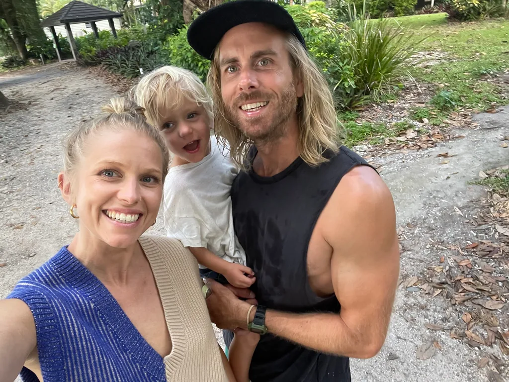 Image of mum, dad and son at the park