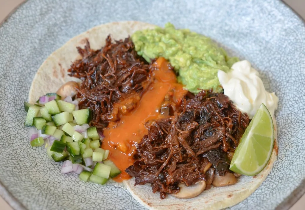 Slow cooked beef brisket tacos