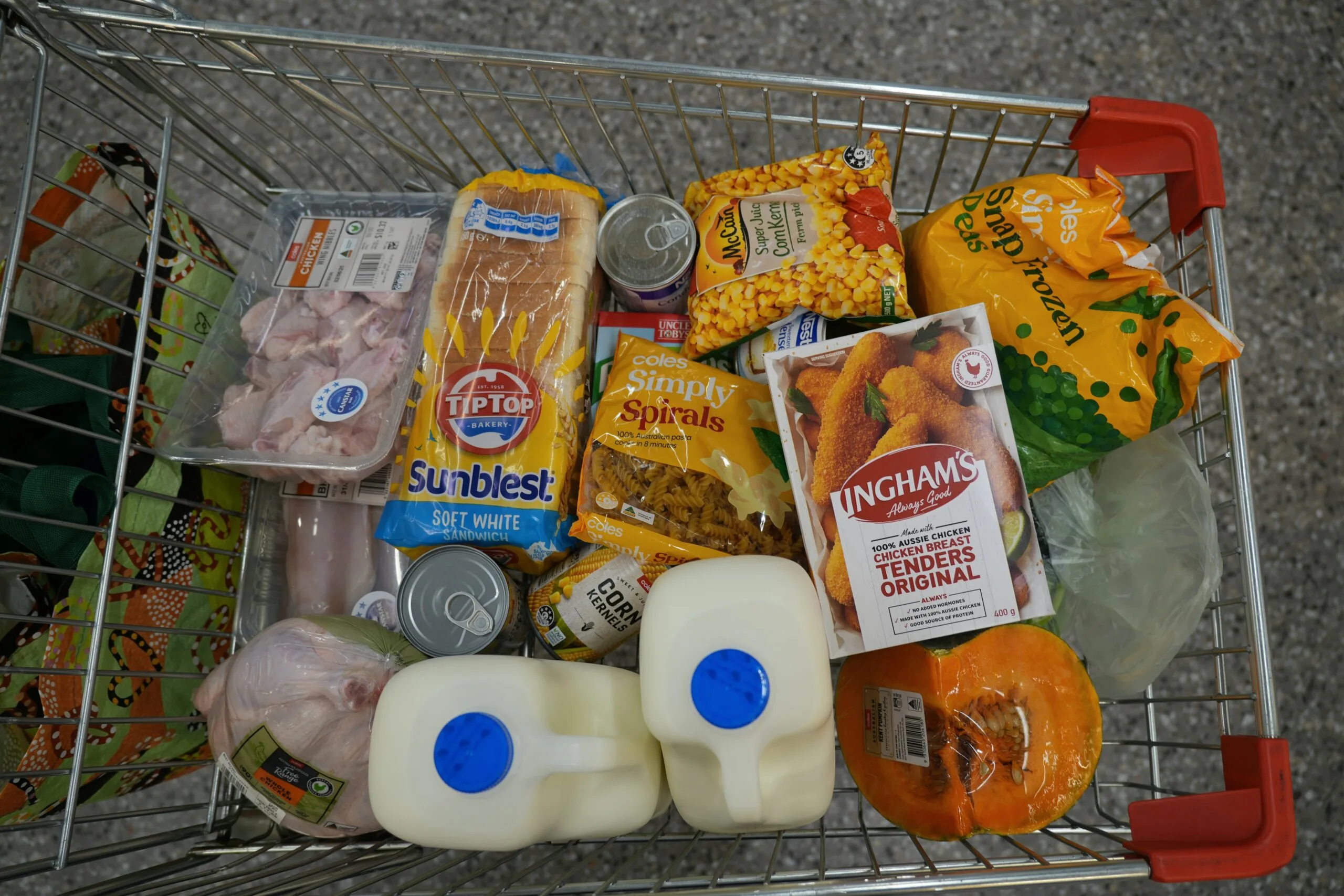 A shopping trolley filled with ingredients for home cooked meals