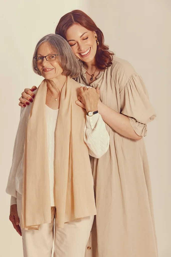 two women in beige