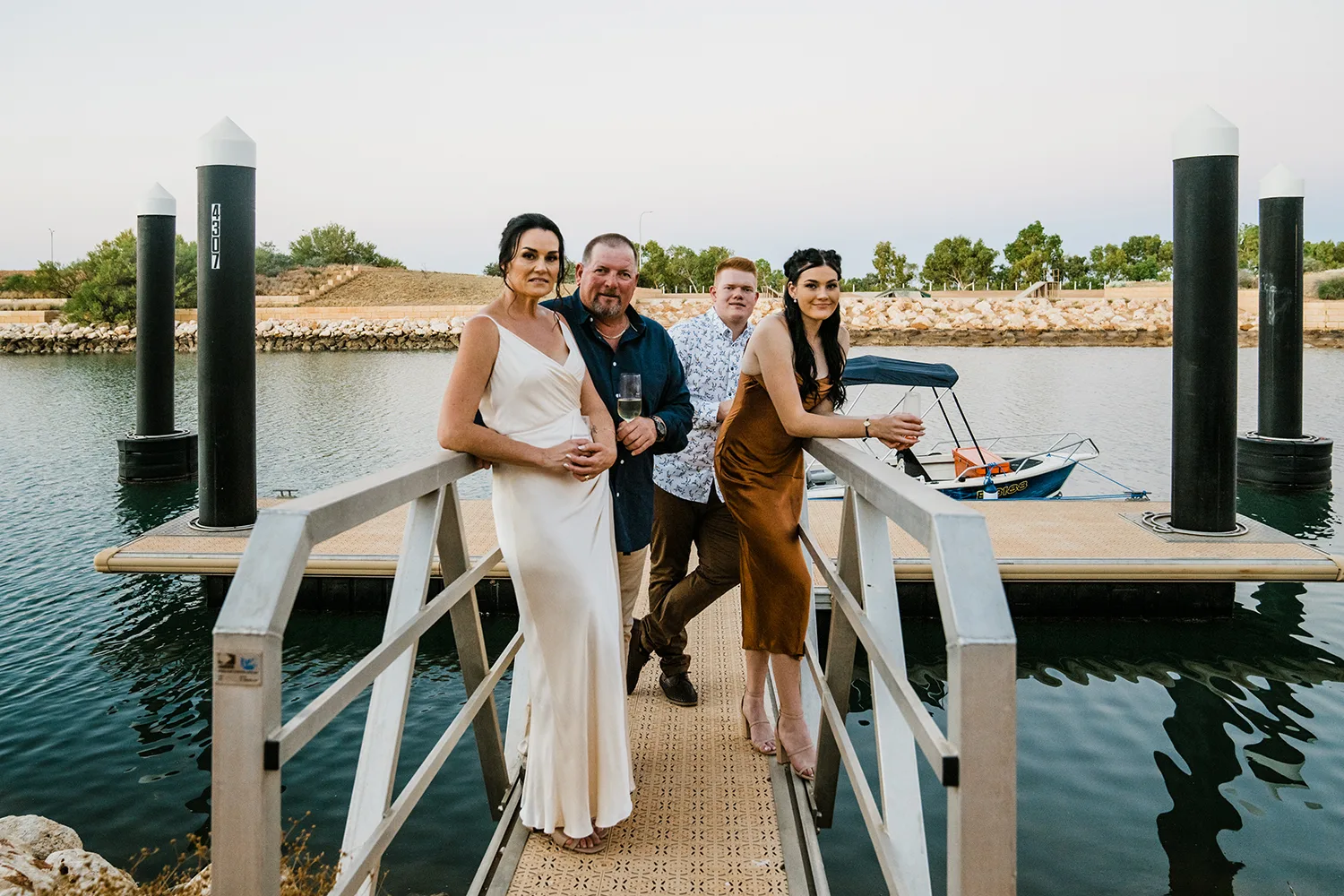 group of people well dressed at jetty