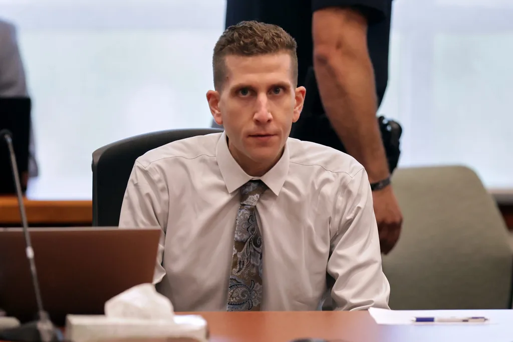 man in cream shirt, paisley tie