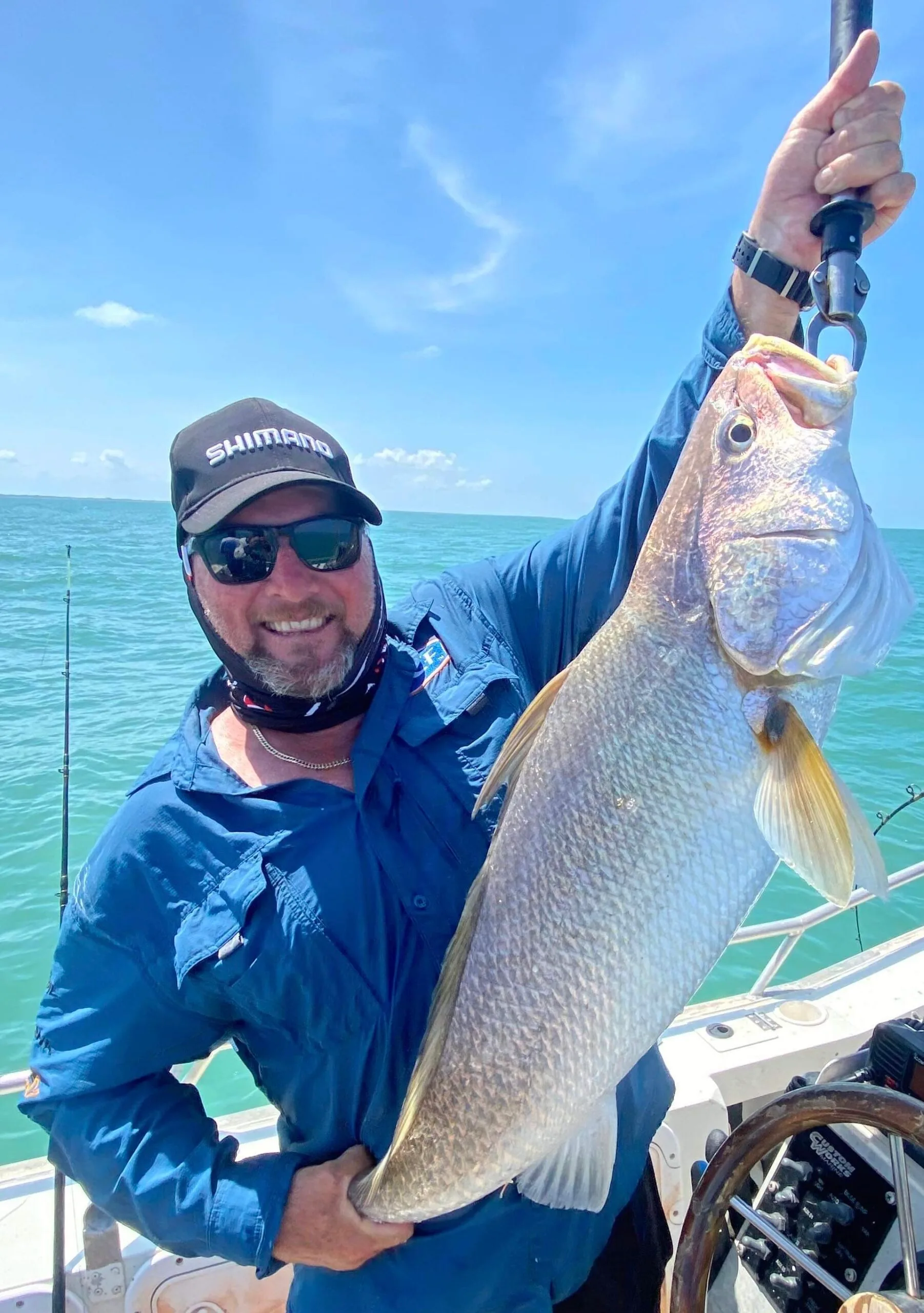 man holding big fish