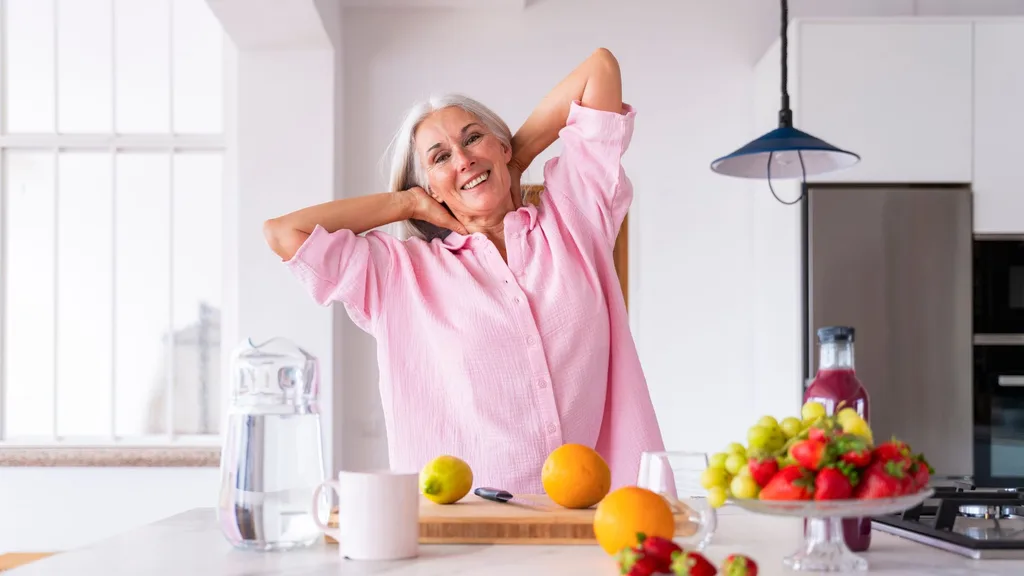 mature lady streching in the kitchen