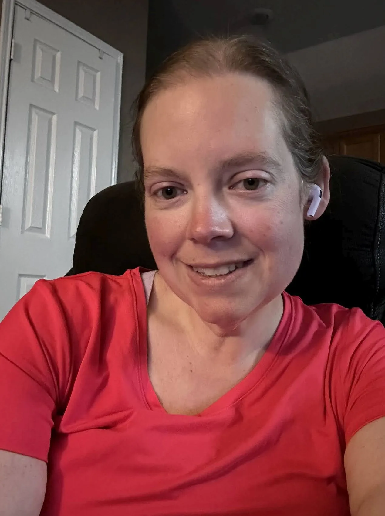 Smiling woman in red tshirt