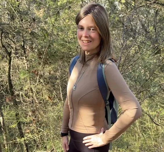 Smiling woman on a bush walk