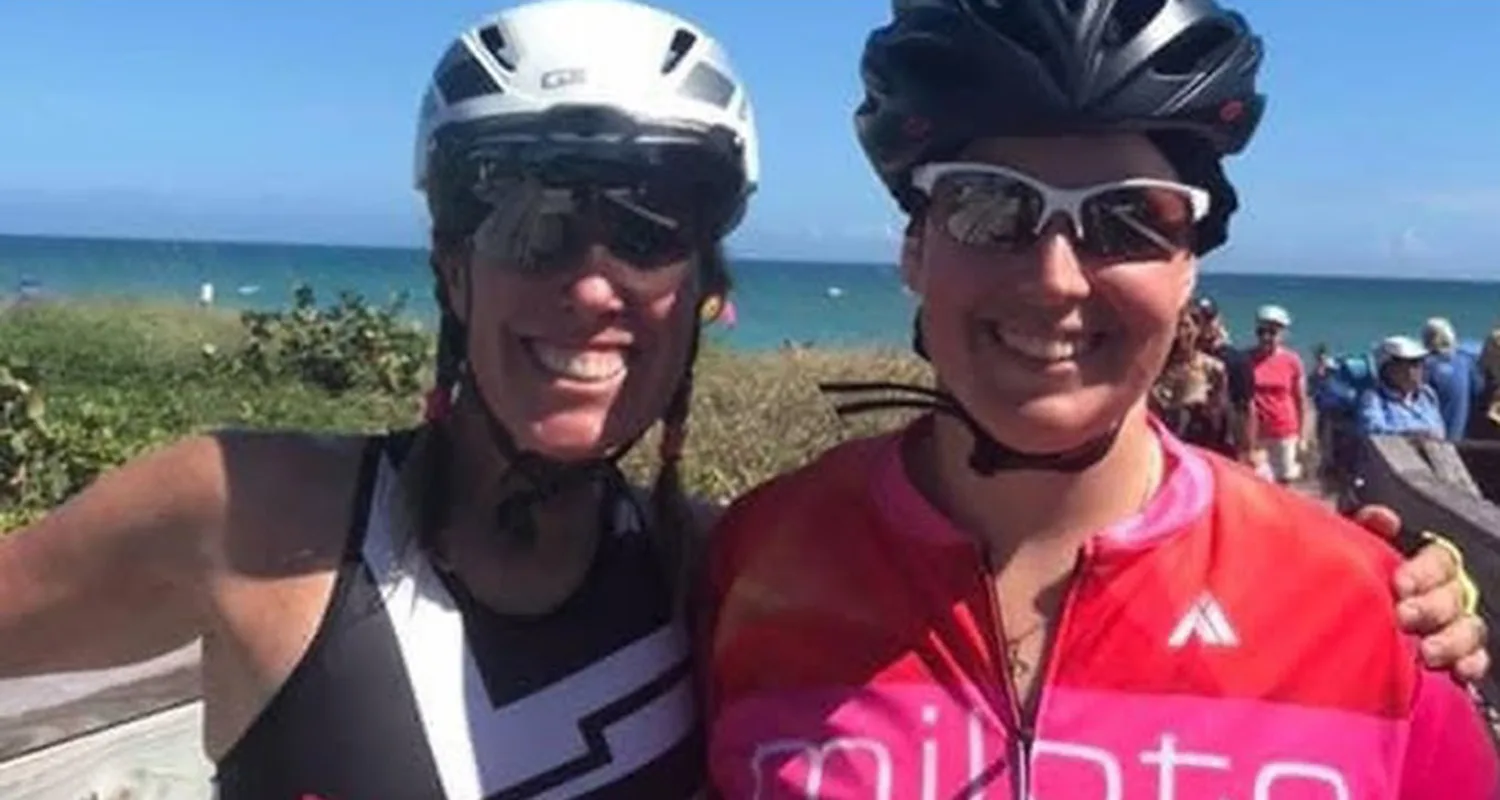 Liz Hickox pictured with Sarah Delashmit at a cycling event where they first met before she scammed them with fake cancer.