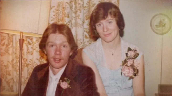 a young couple wearing corsages 