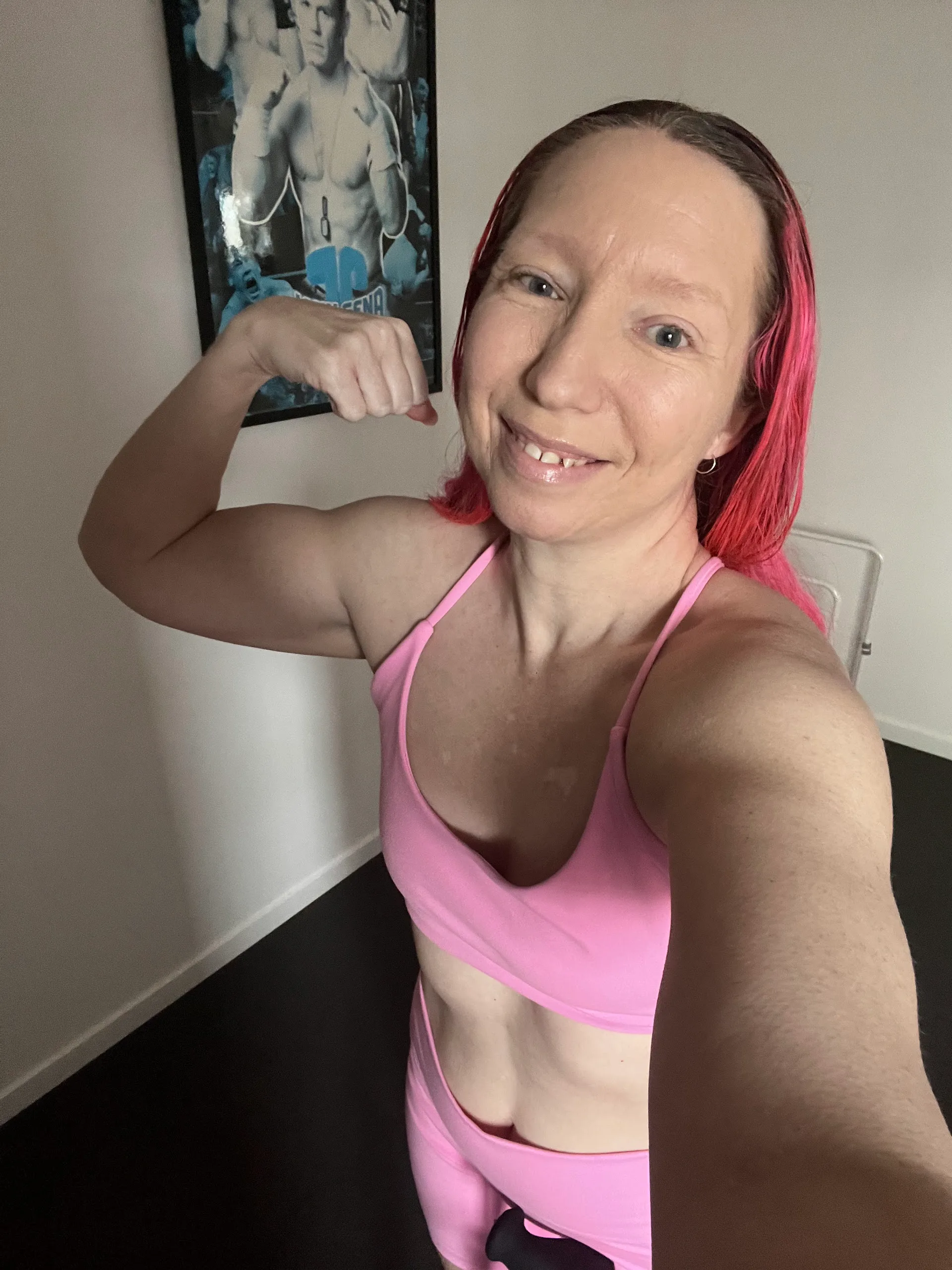 Rebecca training whilst wearing pink clothes for bodybuilding despite being disabled