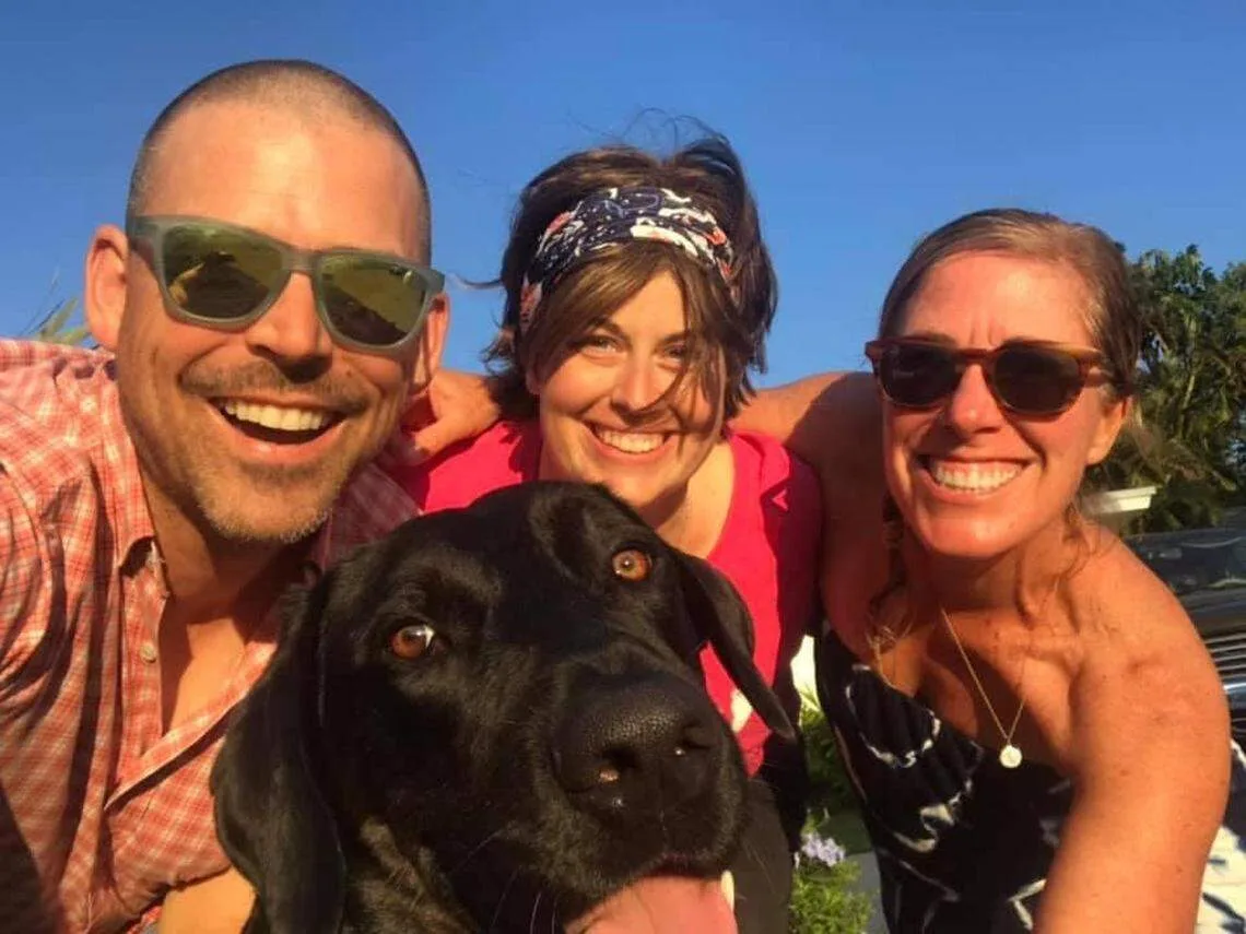 Brian Hickcox, Sarah Delashmit and Liz Hickox pictured together during one of the trips to Florida where Sarah was scamming them with fake cancer.