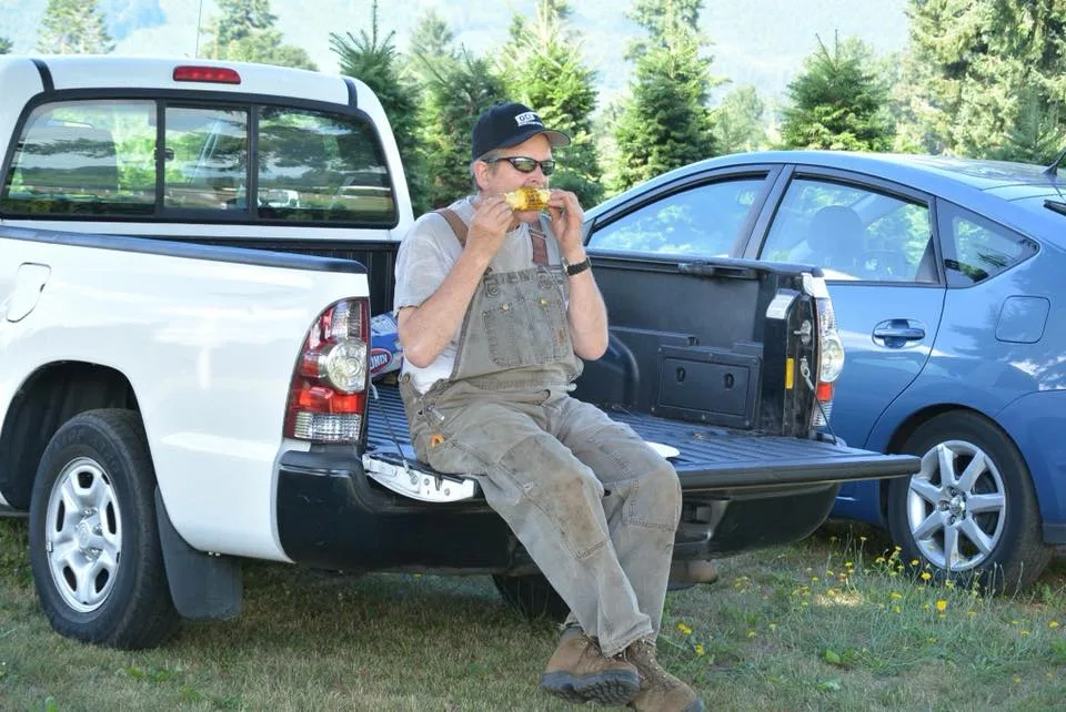 Man sitting on a tailgate