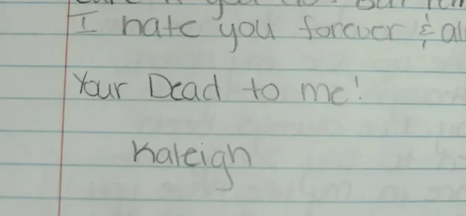 handwritten note in diary that reads ' your dead to me! Kaleigh'