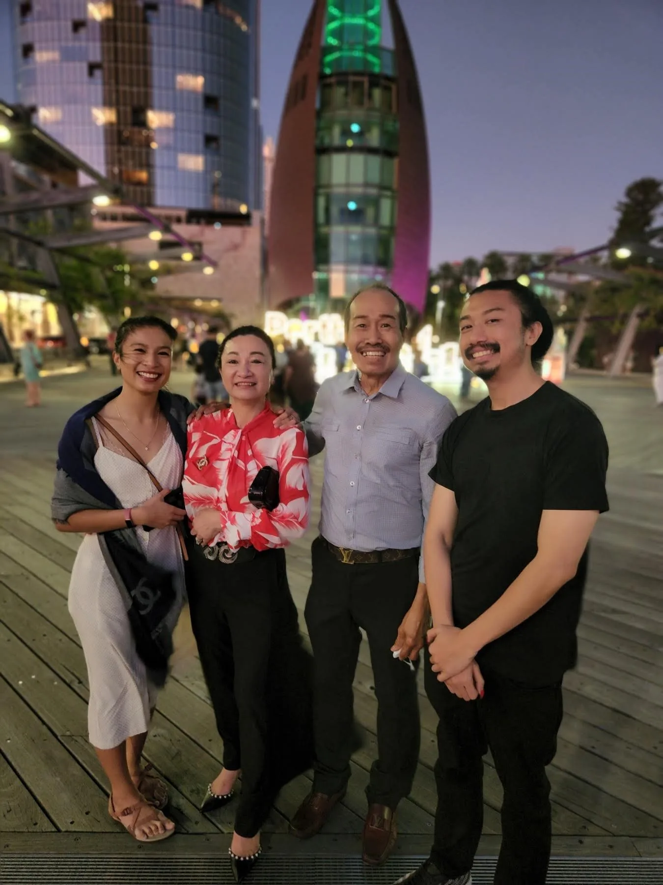 Image of hula hooping champion with family.