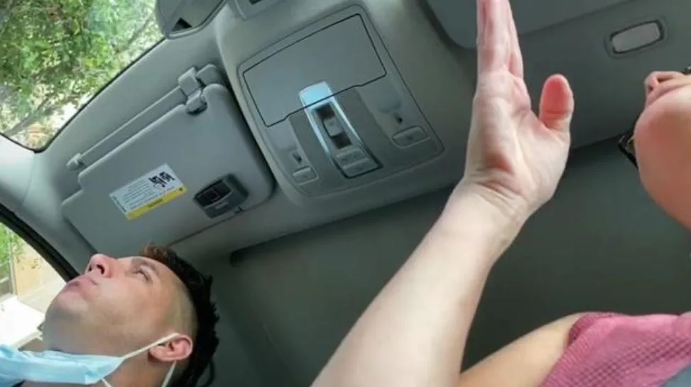 A couple arguing in their car