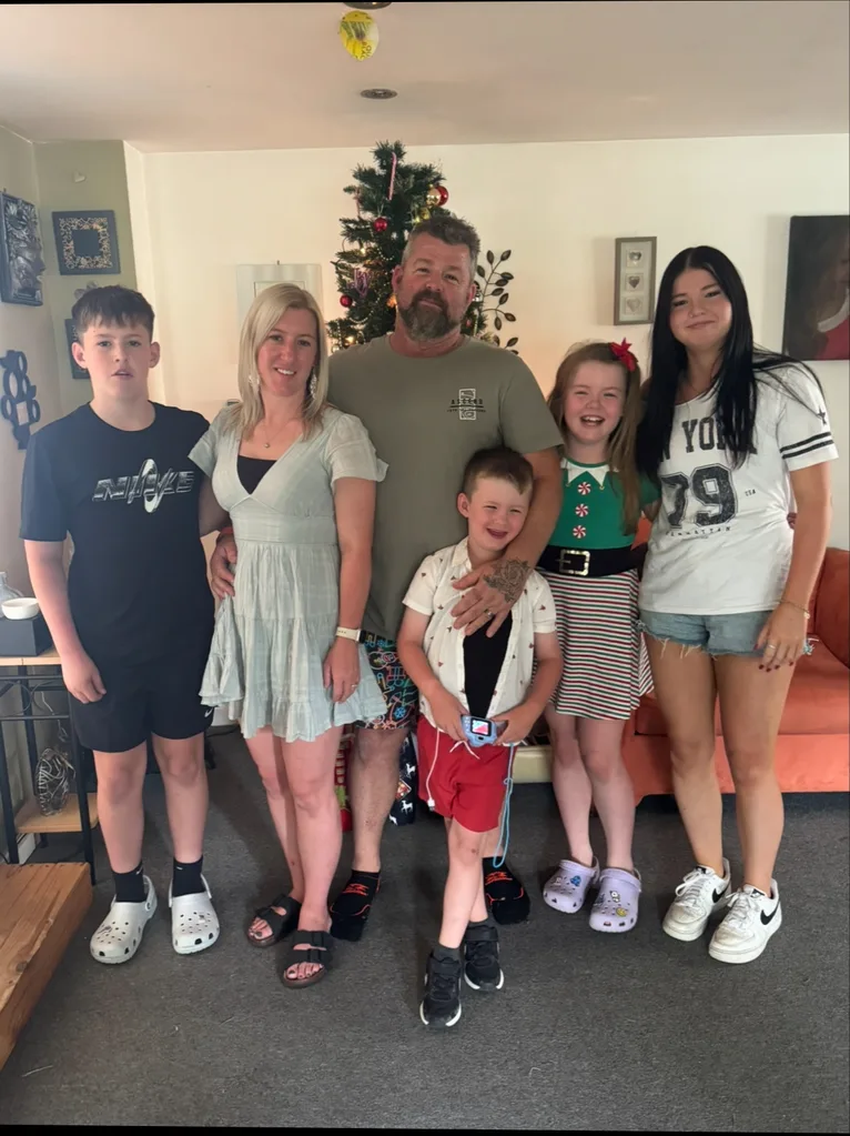 Image of hubby, wife and three kids