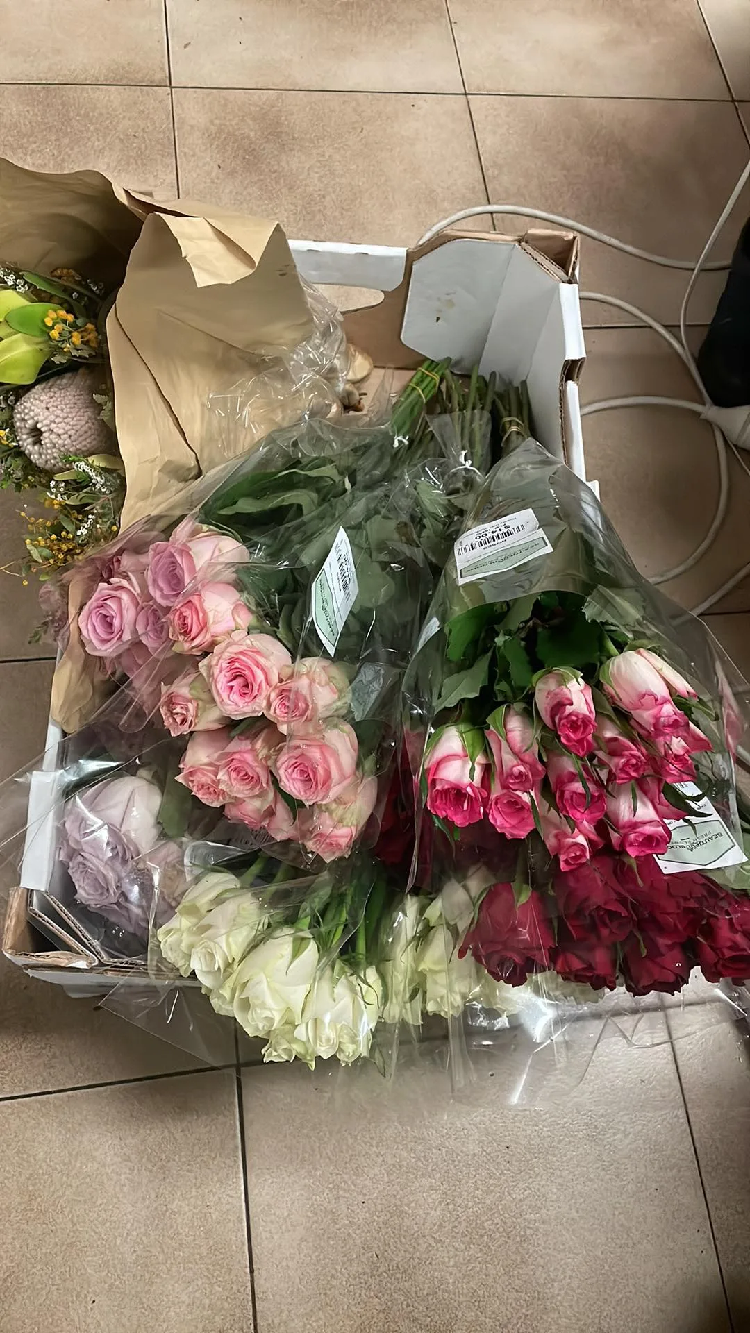 Bunches of flowers that were rescued from the dumpster