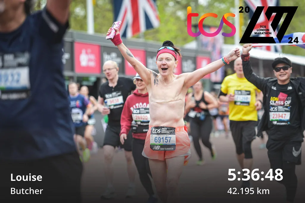 Image of topless woman crossing the marathon finish line
