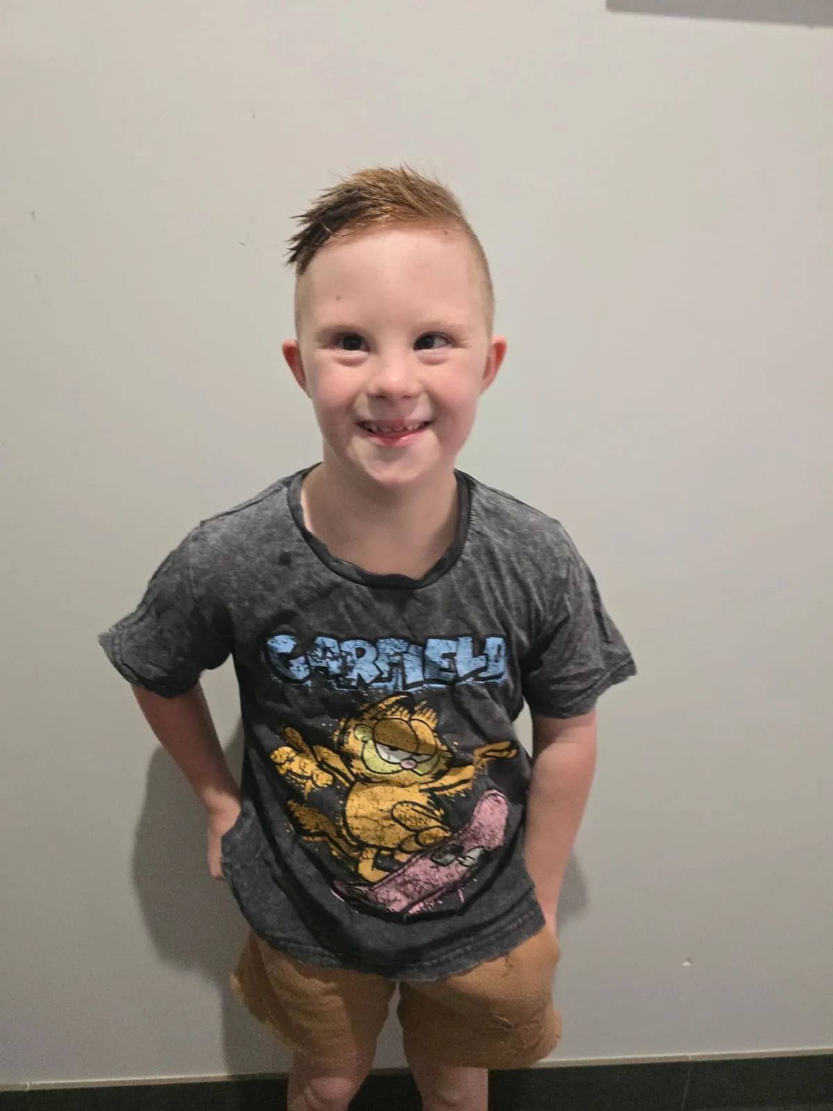 a child in garfield shirt