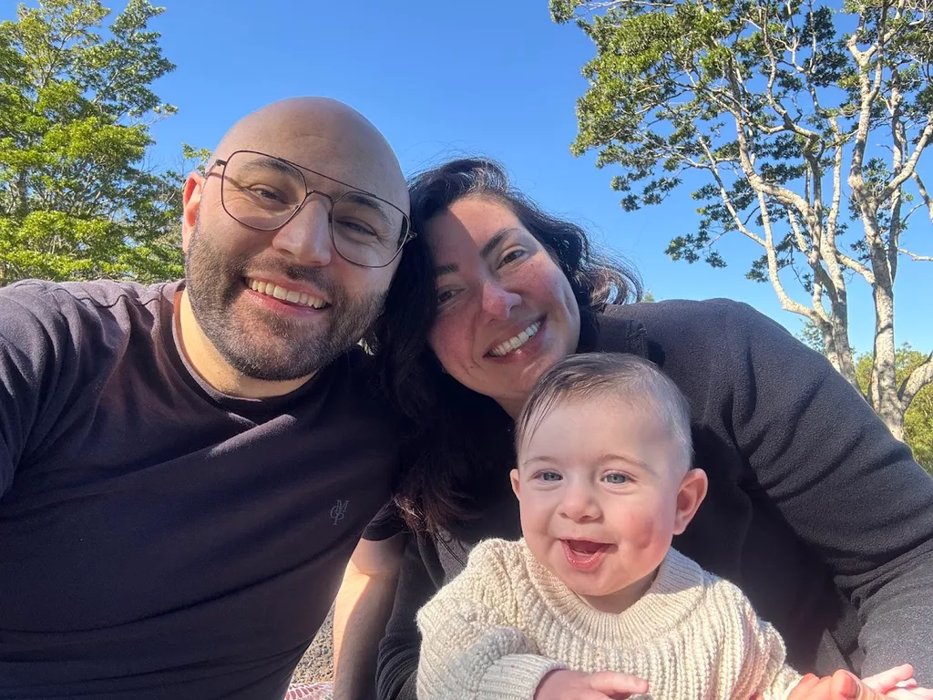 Image of family of three