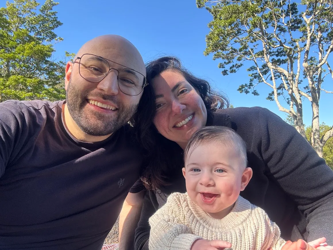 Image of family of three