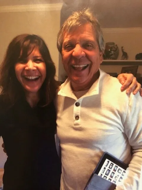 Zara and her birthfather Vittorio smiling