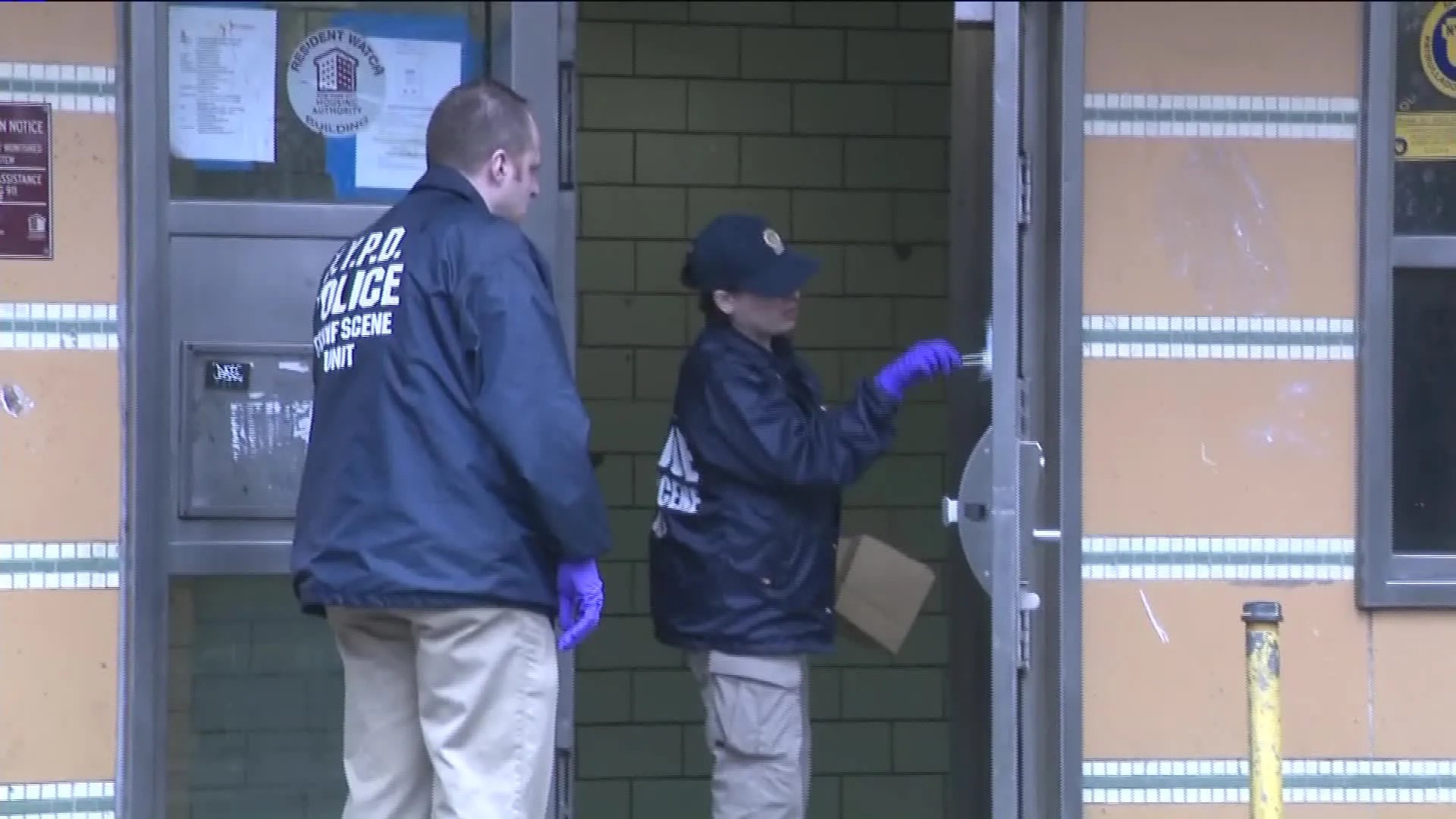 police dusting for fingerprints