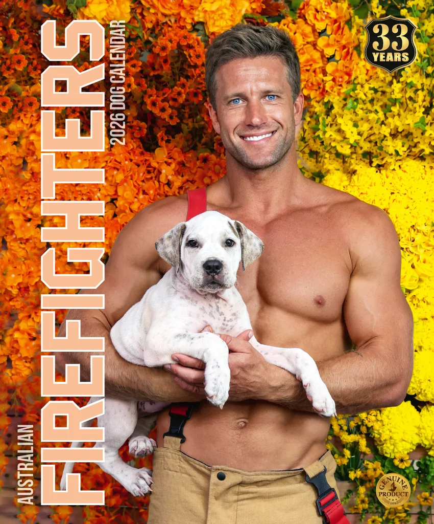Image of firefighter without shirt standing next to cattle dog