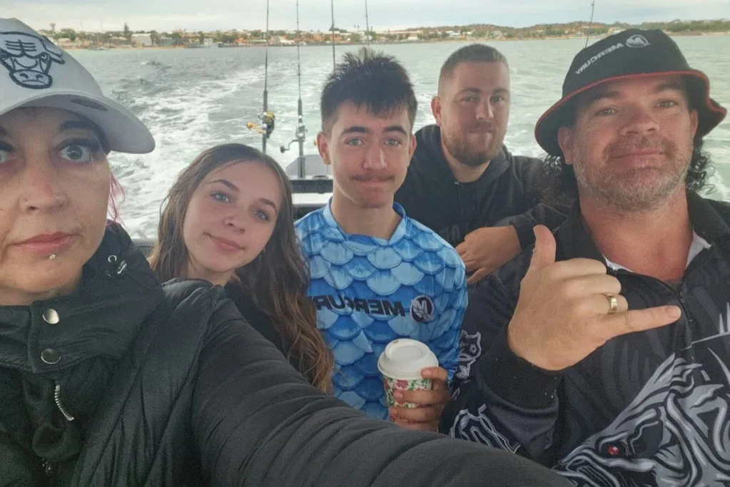 Image of family on fishing boat