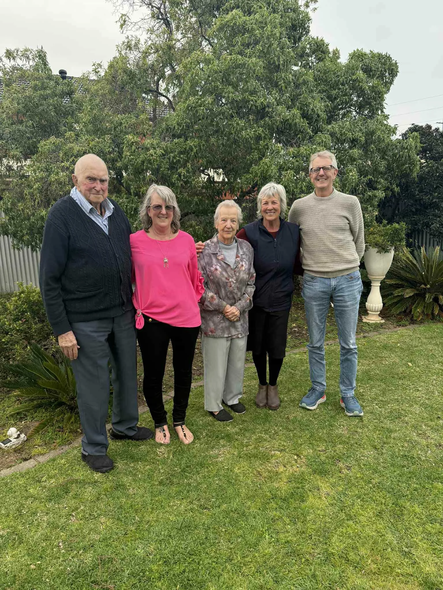 Image of family smiling for a group photo