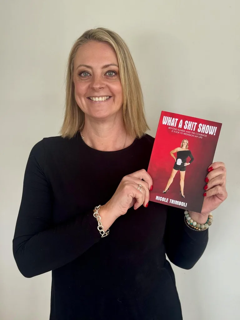 Nicole with her book