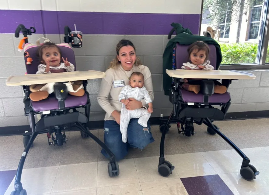 Mum with twin girls and baby