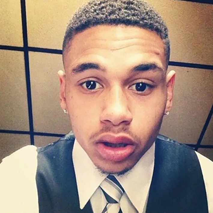 man in white and grey suit