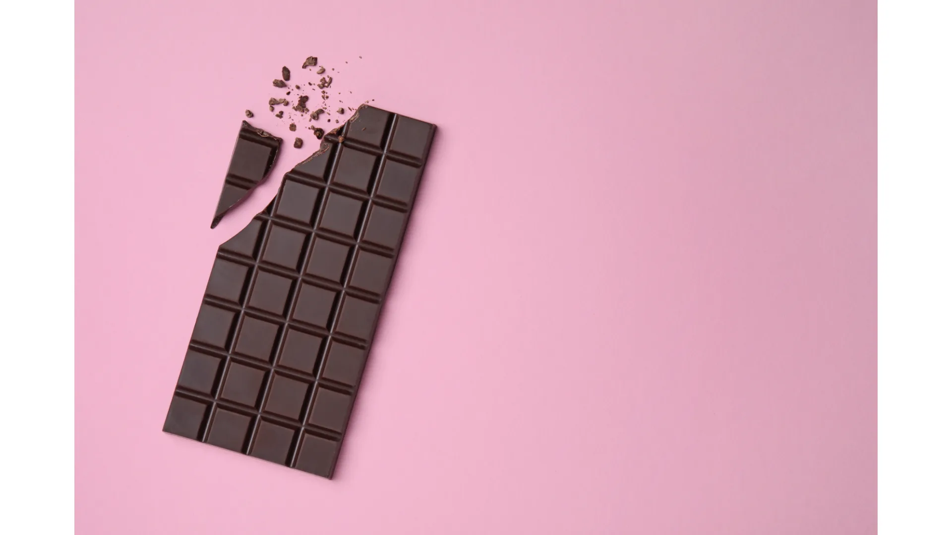 A broken block of dark chocolate.