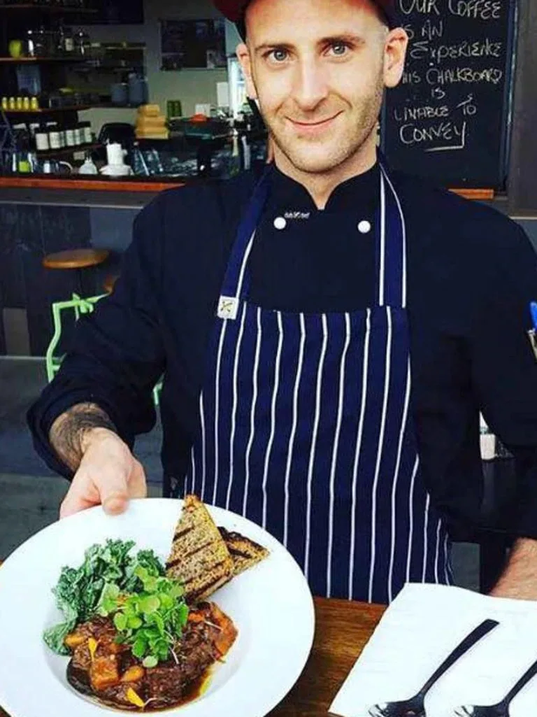 Image of chef fiance holding a dish