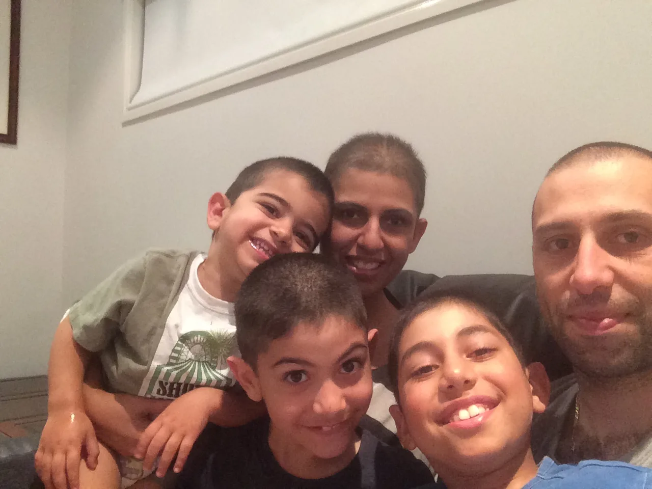 A family group smiling