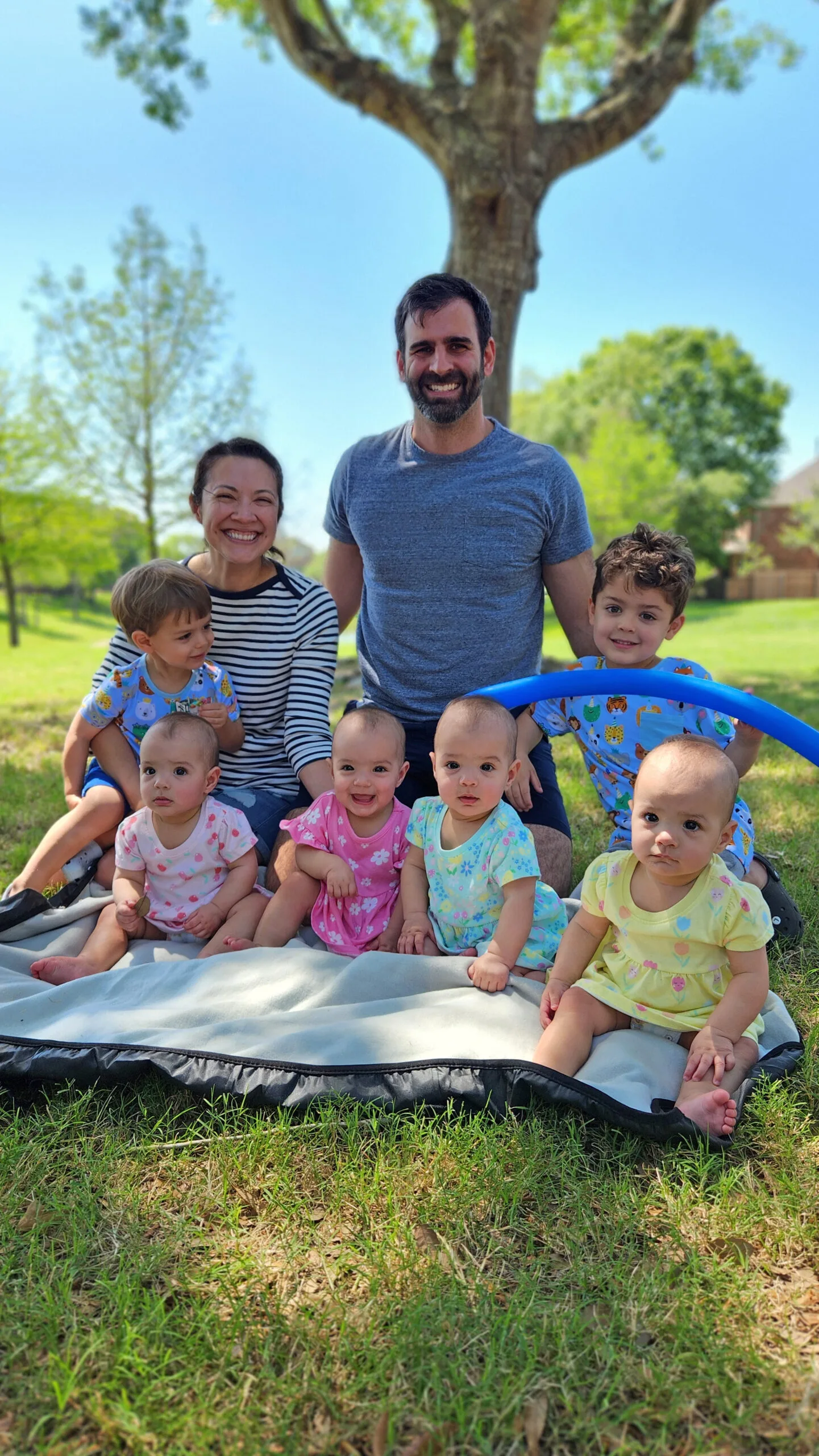 A family photo taken outside