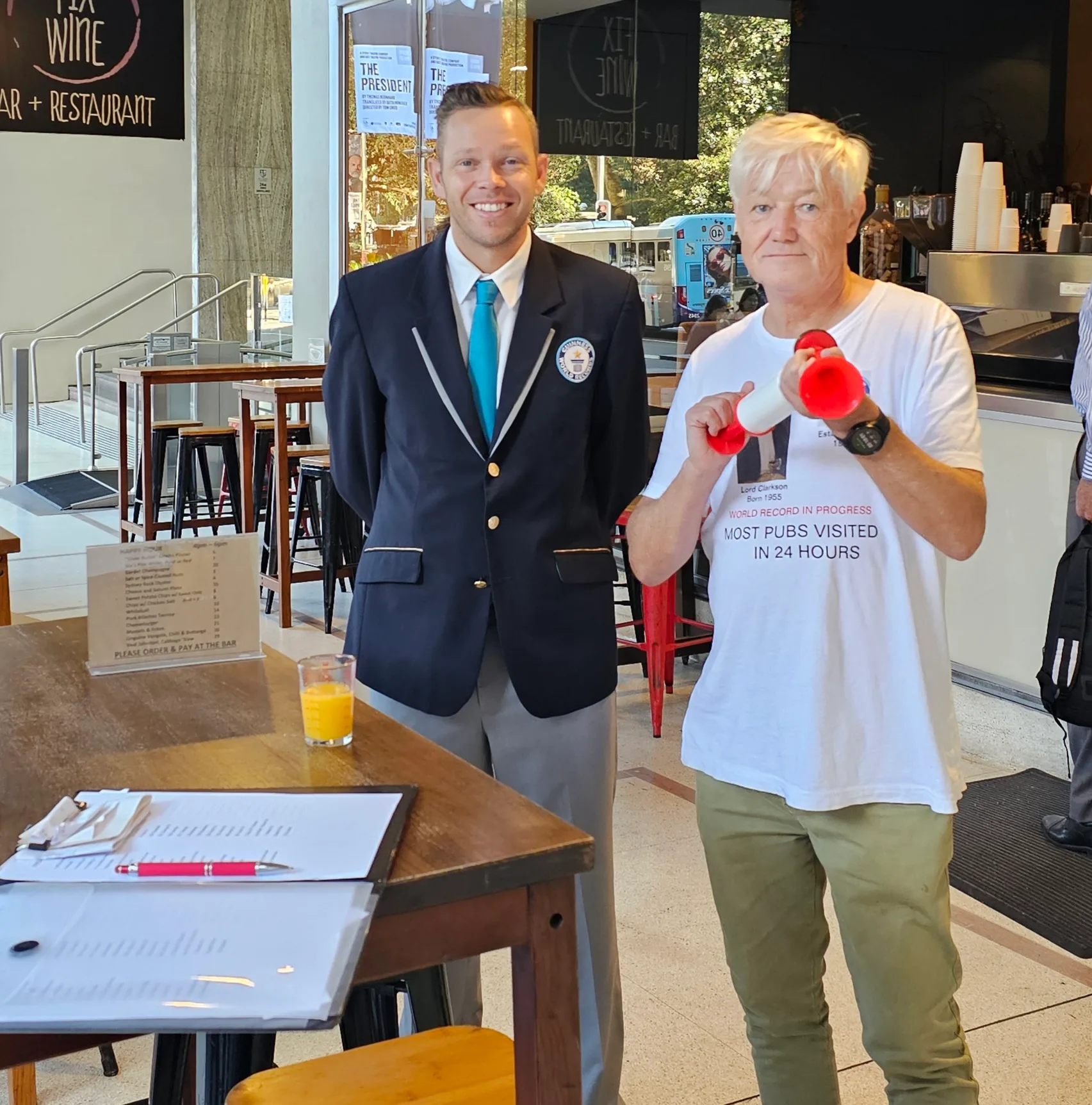 David (right) with the Guinness World Records adjudicator Pete (left), marking a new world record.
