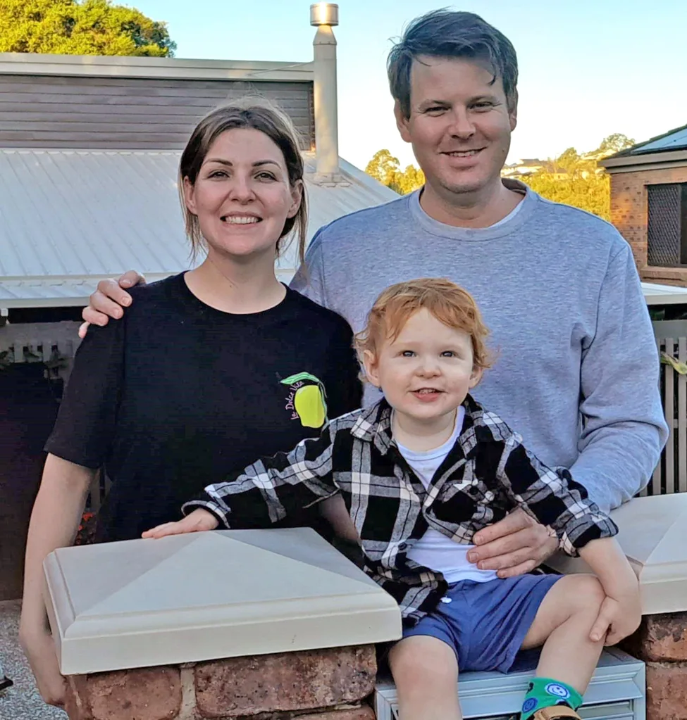 Joey, who has Factor V deficiency, with his mum and dad