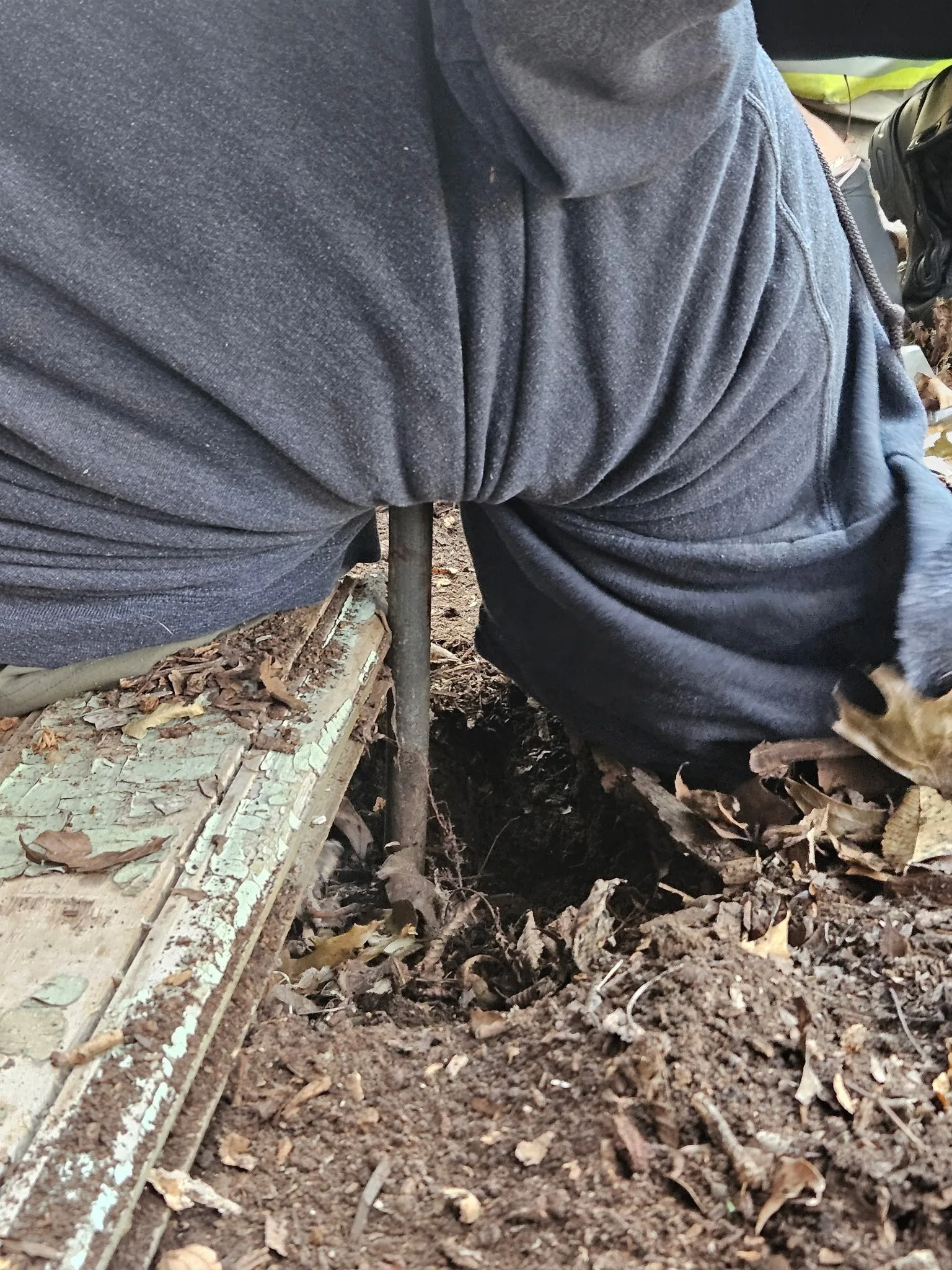 Image of man impaled on a plumbing pipe