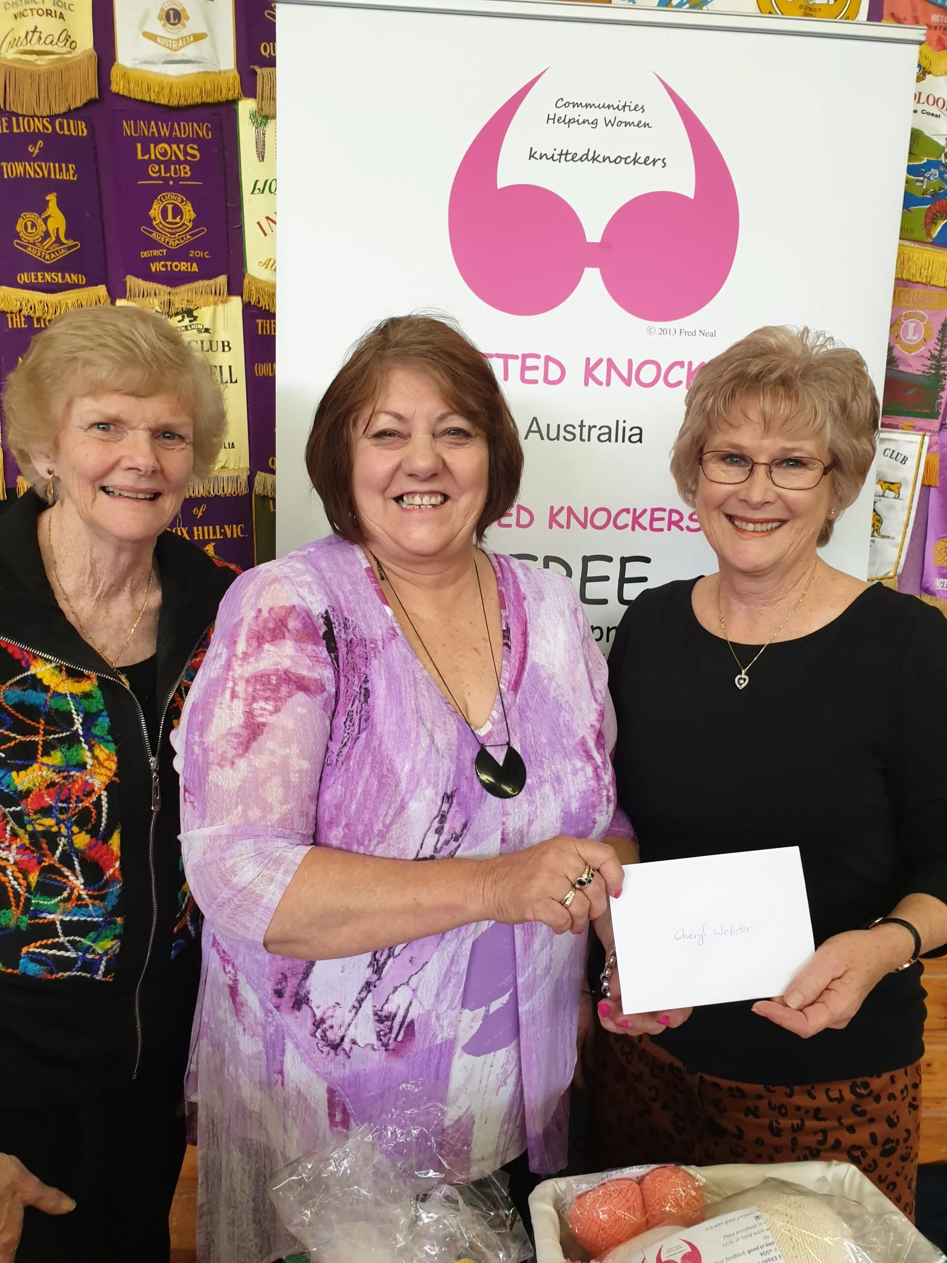 Knitted Knockers' Cheryl and volunteers